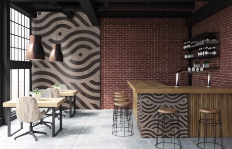 A Custom Modern Swirl Elevation Panel made of Veneer on a Wall in a Bar