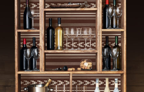 Arrow Traverse wine shelf rendering modern western accent pattern. Warm tones, umber, chocolate